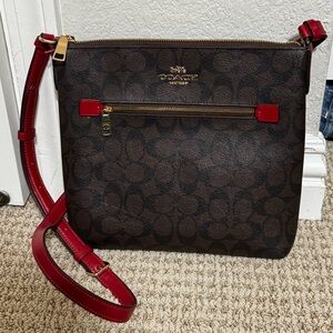 Coach Brown Signature Crossbody with Red Strap Trim